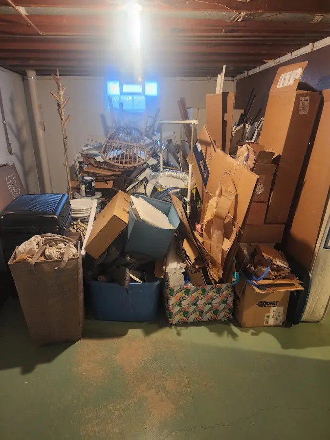 Roll-off dumpster container at job site for Yard Waste Dumpster Rental in Berlin