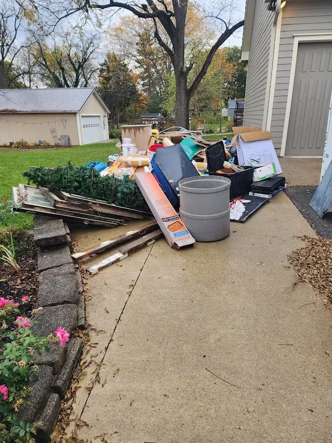 Dumpster being loaded with debris for Residential Dumpster Rental in Berlin